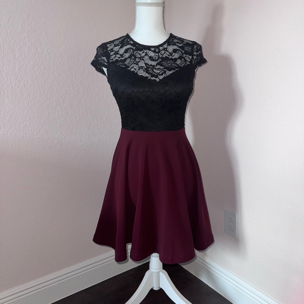 B. Smart Black Dress with Lace Detail